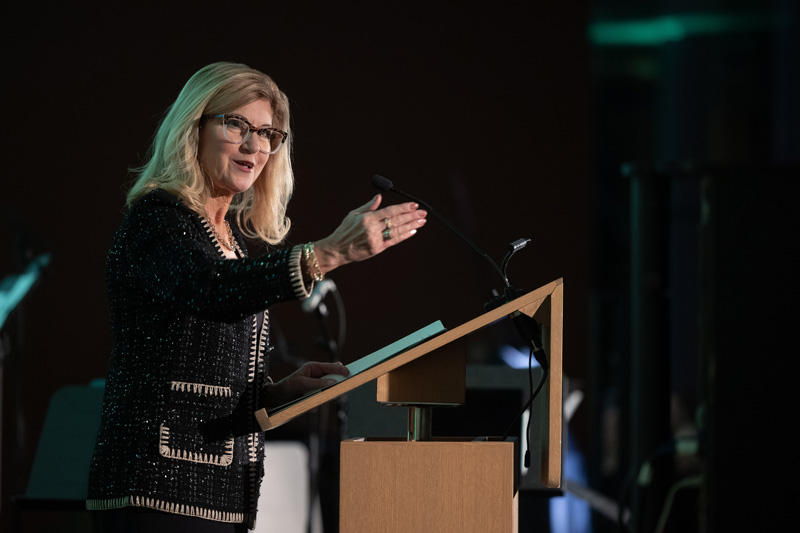 Renowned Canadian artist Phil Richards and USask President Peter Stoicheff are pictured beside the president’s official painted portrait. (Photo: David Stobbe)