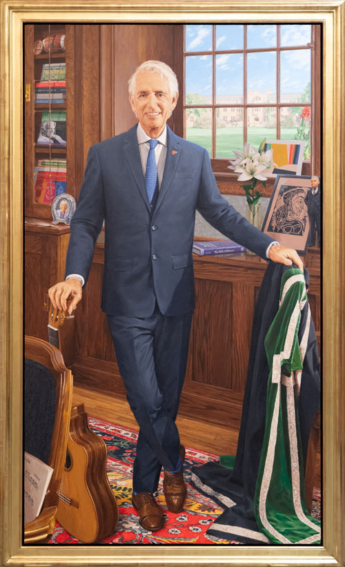 Renowned Canadian artist Phil Richards and USask President Peter Stoicheff are pictured beside the president’s official painted portrait. (Photo: David Stobbe)