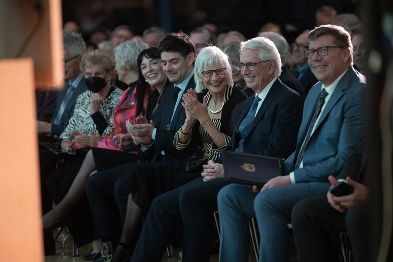 Renowned Canadian artist Phil Richards and USask President Peter Stoicheff are pictured beside the president’s official painted portrait. (Photo: David Stobbe)
